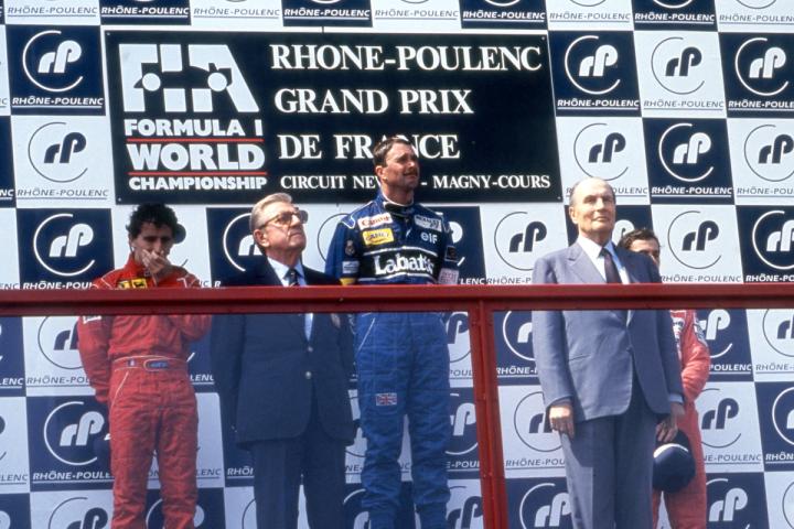 Nigel Mansell looking proud on the podium pride after winning his third French Grand Prix in 1991