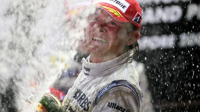 Nico Rosberg’s sprays the champagne on the Singapore podium after F1’s first ever night race – 2008