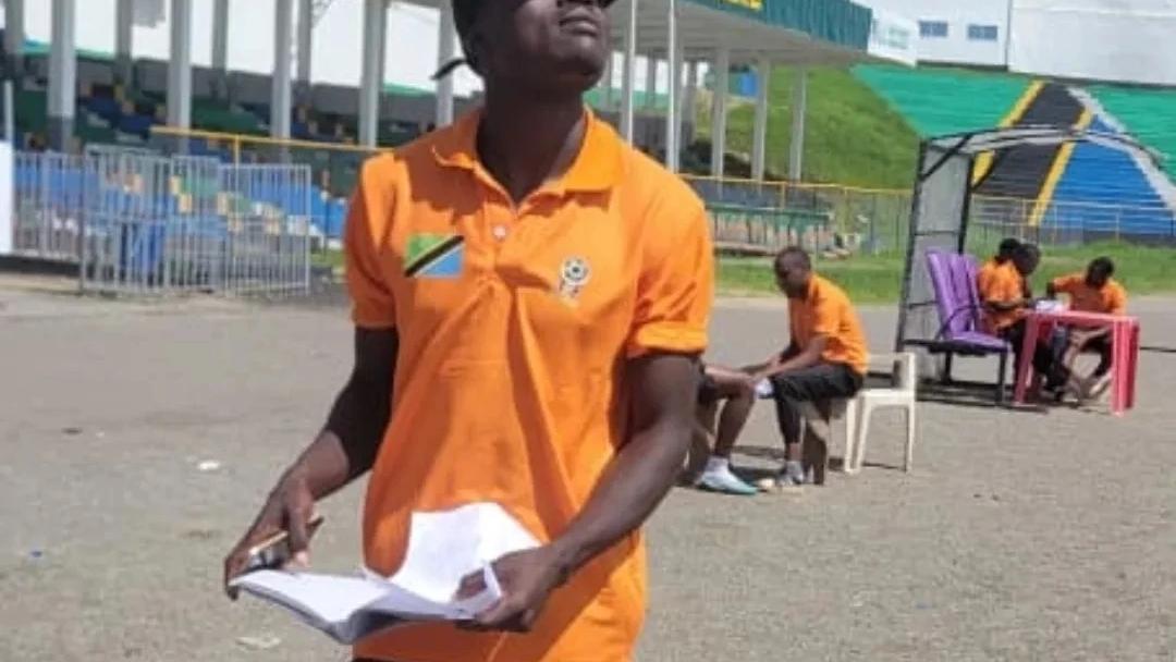 Football coach participating in a coaching activity at a Sokoine Stadium
