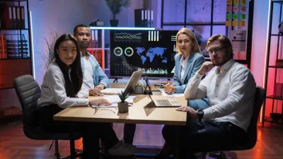 The image depicts a futuristic digital interface featuring a glowing holographic globe surrounded by high-tech data visualizations, circuit-like patterns, and analytical graphs. Various illuminated elements, including circular target-like structures and interconnected nodes, suggest themes of global connectivity, data exchange, and advanced technology. The color scheme consists of cool tones, predominantly blue and white, emphasizing a cybernetic and sci-fi aesthetic.