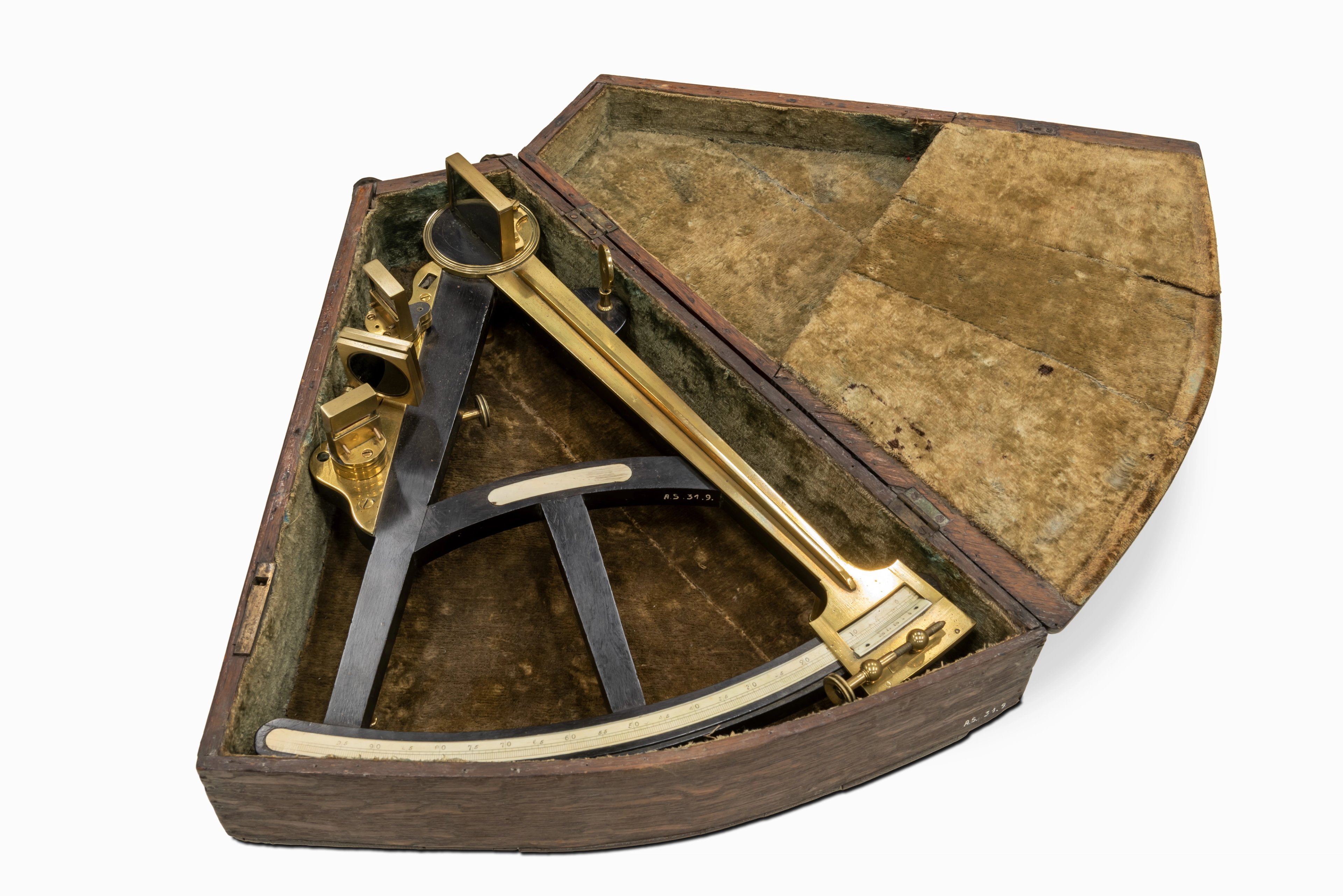Image of a celestial navigation device - an octant - in its case. The device is made from black painted wood and has brass fittings. It is is shaped as a section of a circle, with a graduated 45-degree arc as one of its edges.