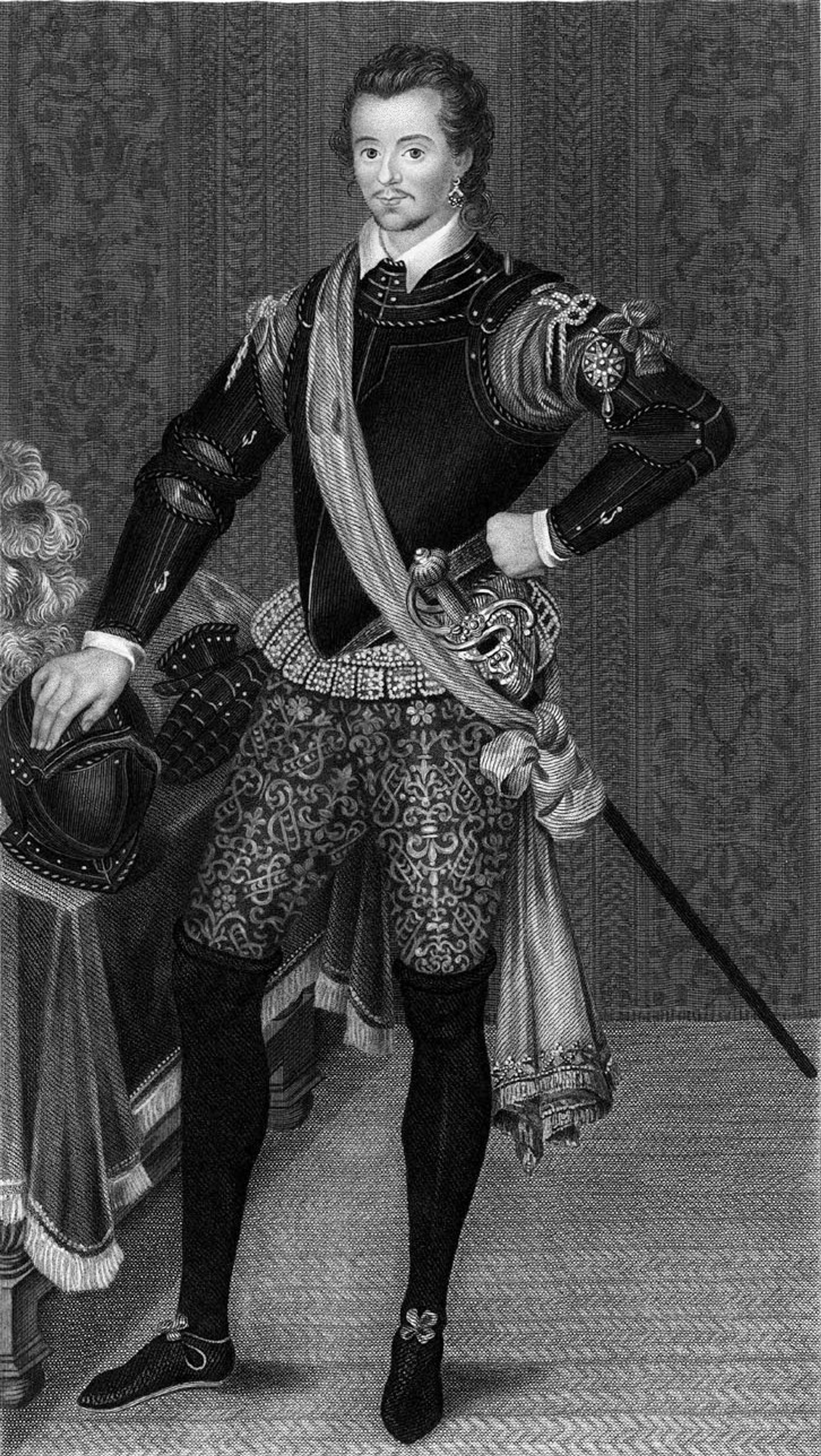 Full body black and white portrait of Robert Dudley, a man with dark short hair and is well dressed with a sword hanging from his left hip.