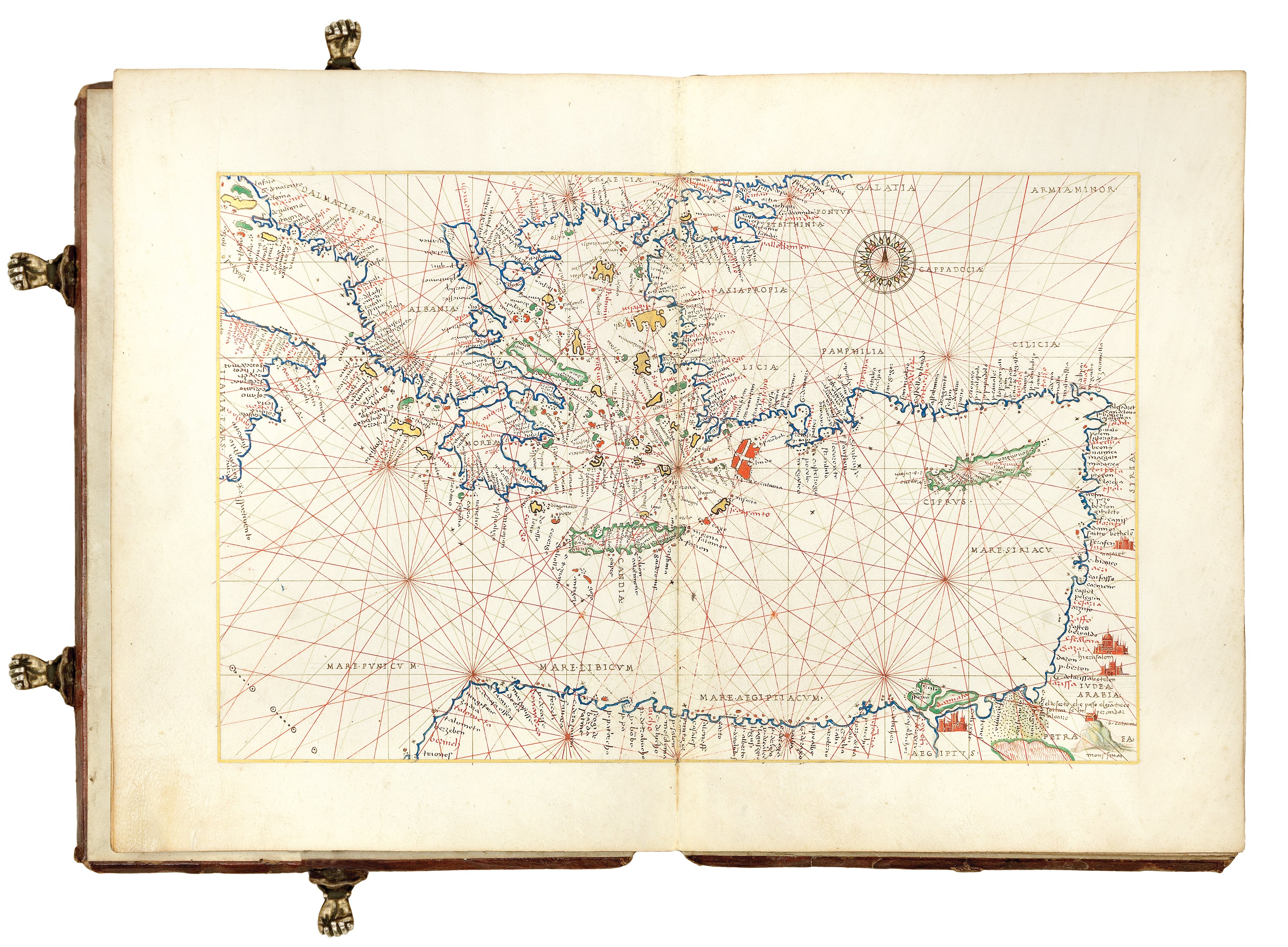 Portolan map of the Mediterranean, showing the outline of the coasts and the Sea crisscrossed by lines. A compass rose is in the Sea, and some of the islands are coloured. Hand painted on vellum. 