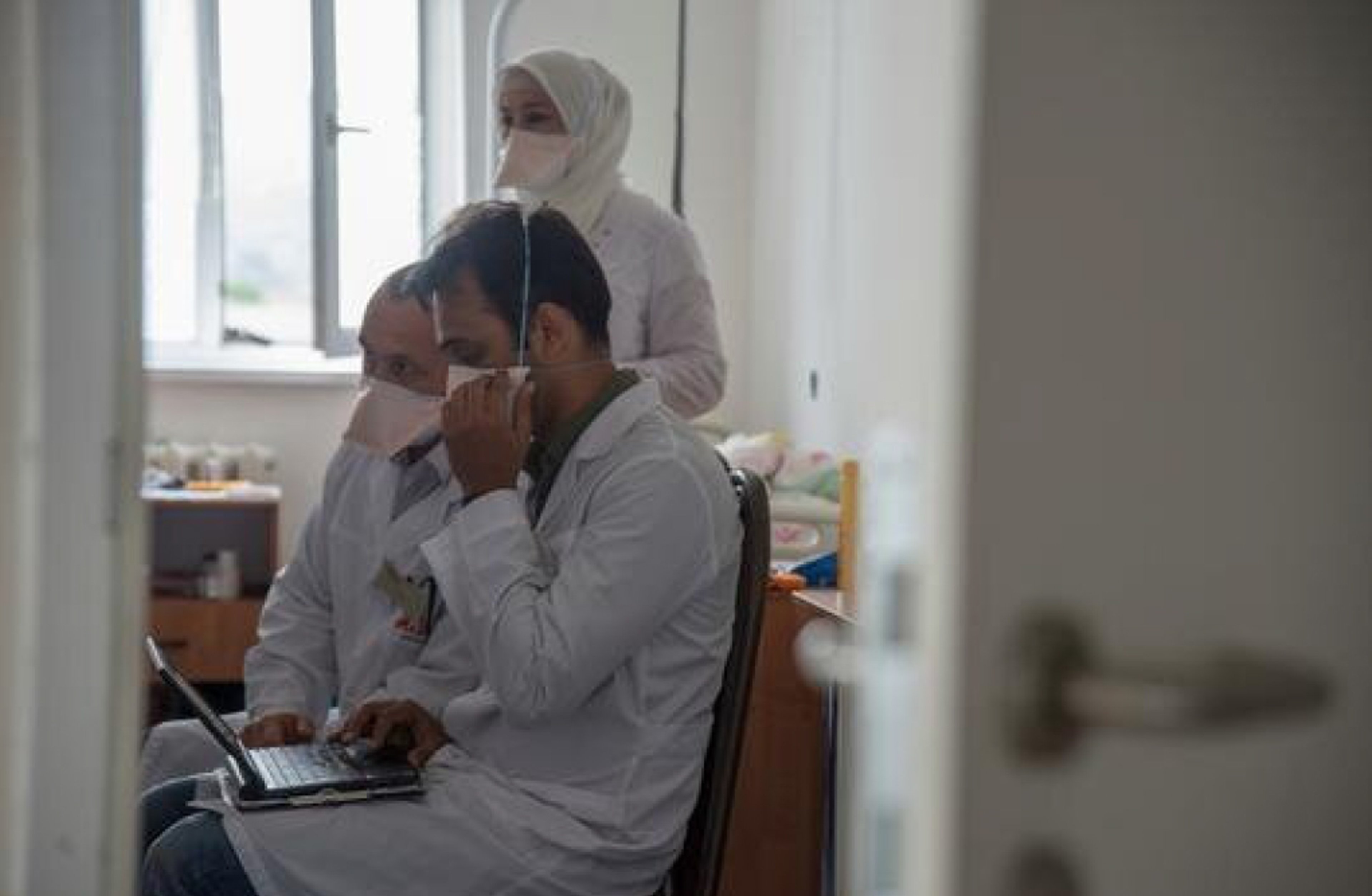 MSF doctor Animesh Sinha with members of MSF TB team checking a patient’s history on a ward in the XDR TB department of the Republican TB Dispensary in Grozny, Chechnya.