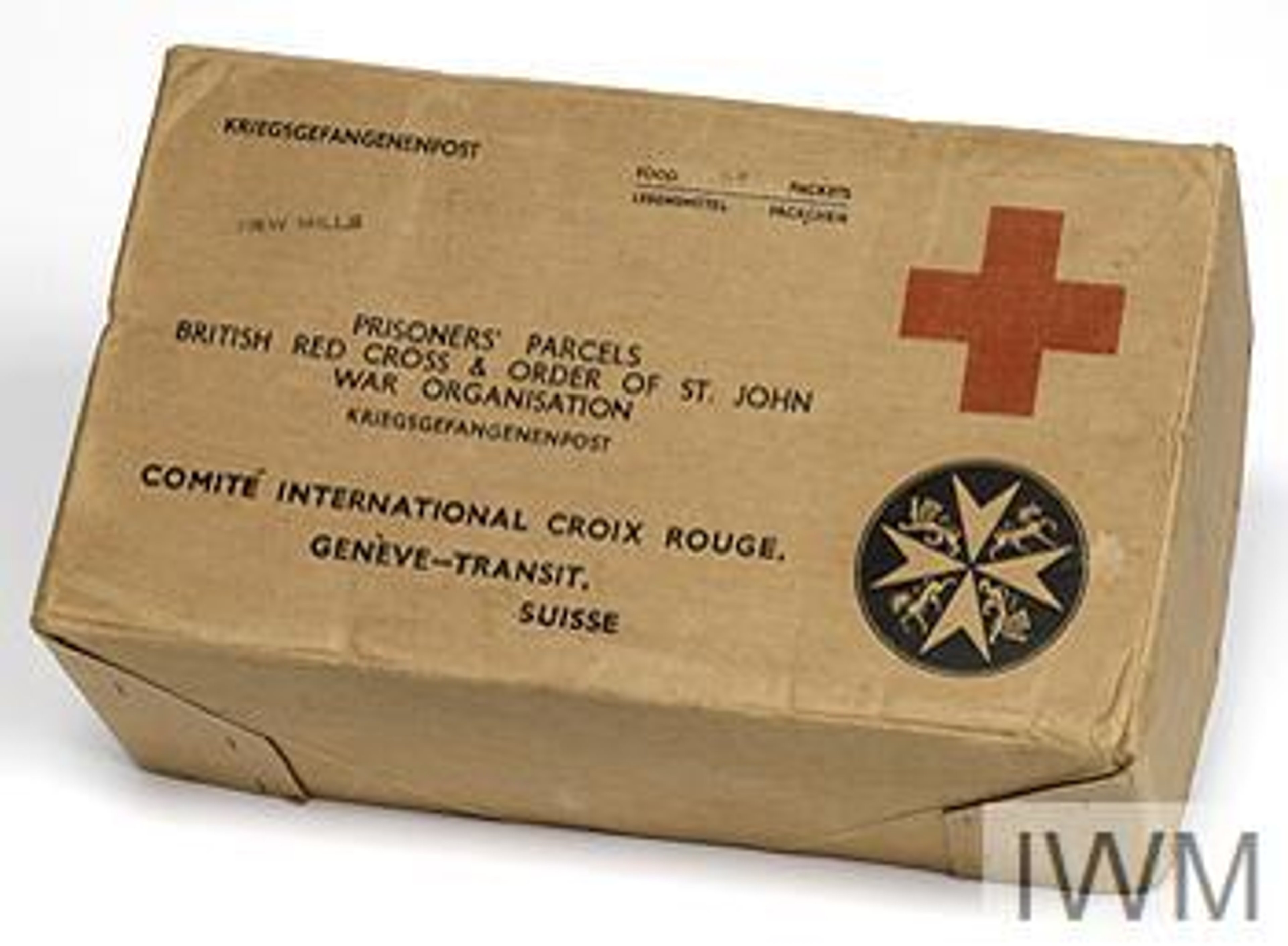 Two-part brown cardboard box bearing the symbols of the Red Cross and the Order of St. John's. The box is printed with the words "PRISONERS' PARCELS BRITISH RED CROSS & ORDER OF ST. JOHN WAR ORGANISATION KRIEGSGEFANGENENPOST" in black letters. "NEW MILLS" is stamped onto the top of the box.
