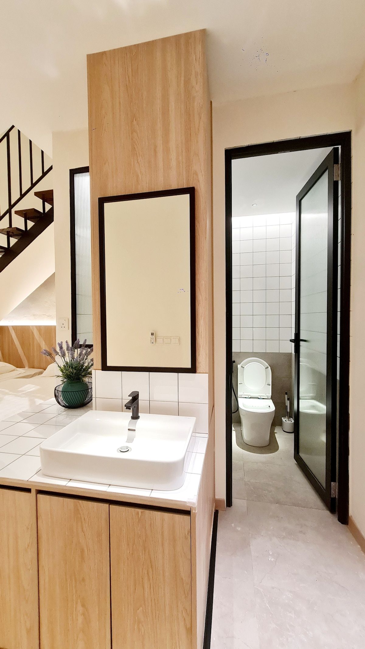 Kazuki duplex bathroom with sink and shower partition