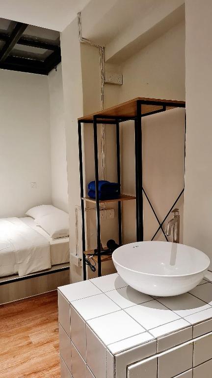 Stewart Hotel large-bed room with vanity counter