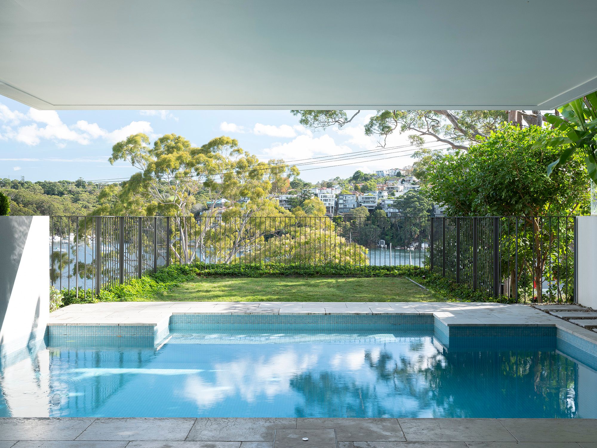 Pool at Shellbank House looking over the lawn to Middle Harbour