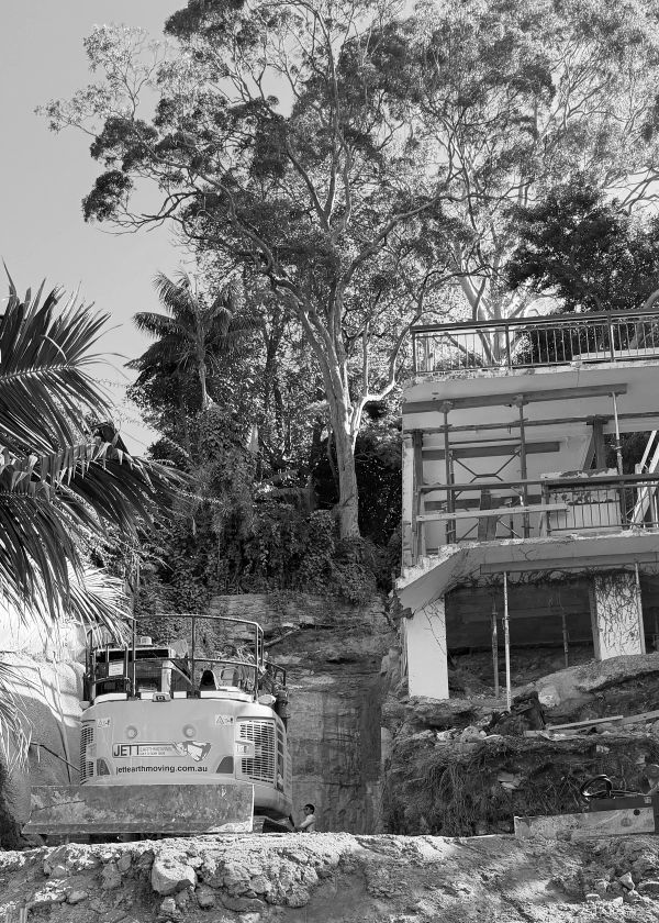 Excavator working below the existing house at Kiora