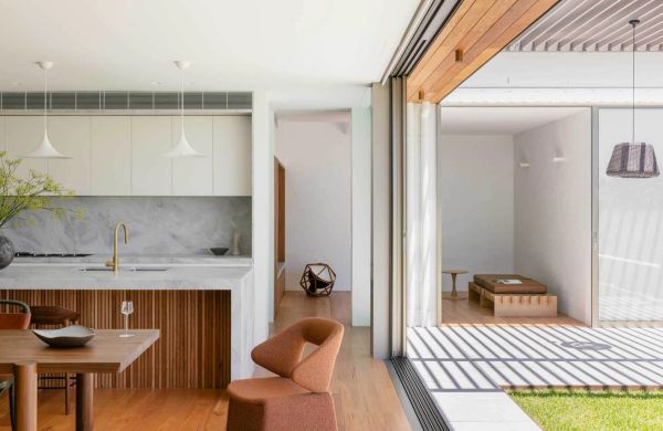 Casa Risata kitchen and living room opening to a covered terrace