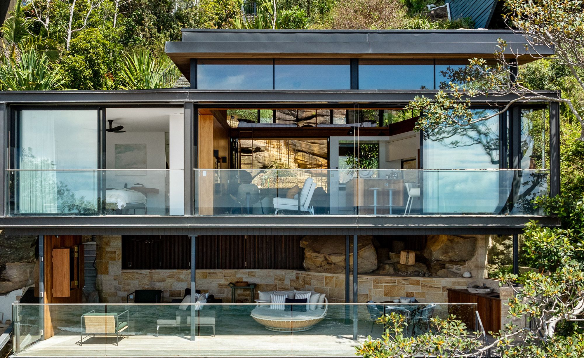 Glass fronted pavilion cantilevered above the bush at Palm Beach