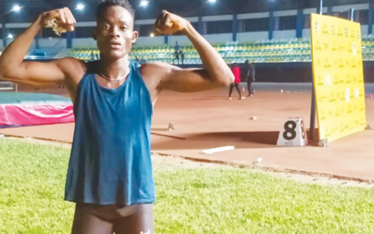 Cover image for Israel Okon claims 100m title in style