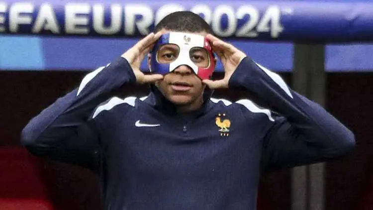 Cover image for UEFA to block Mbappé from wearing France flag mask at Euro 2024