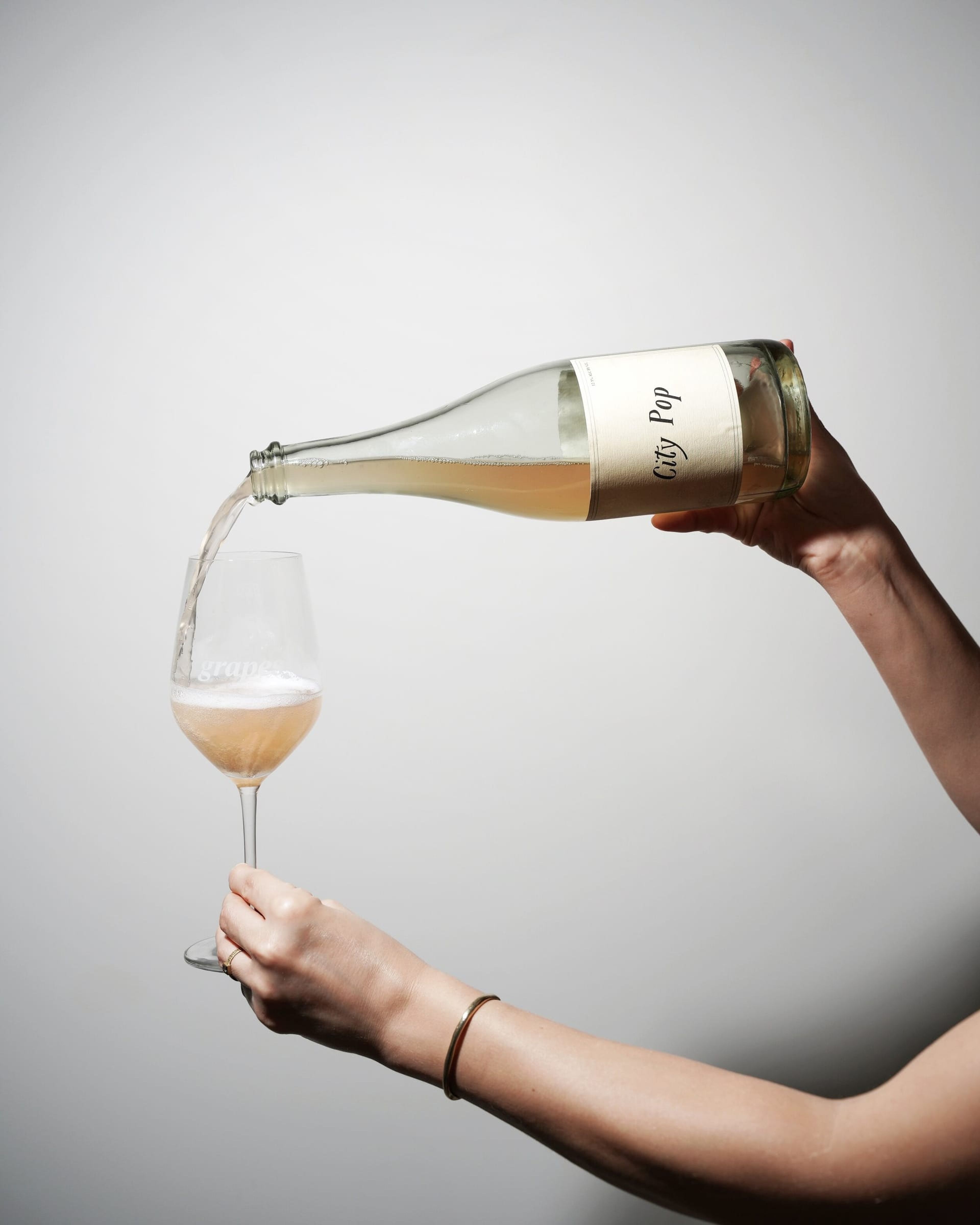 Pouring sparkling wine into a glass
