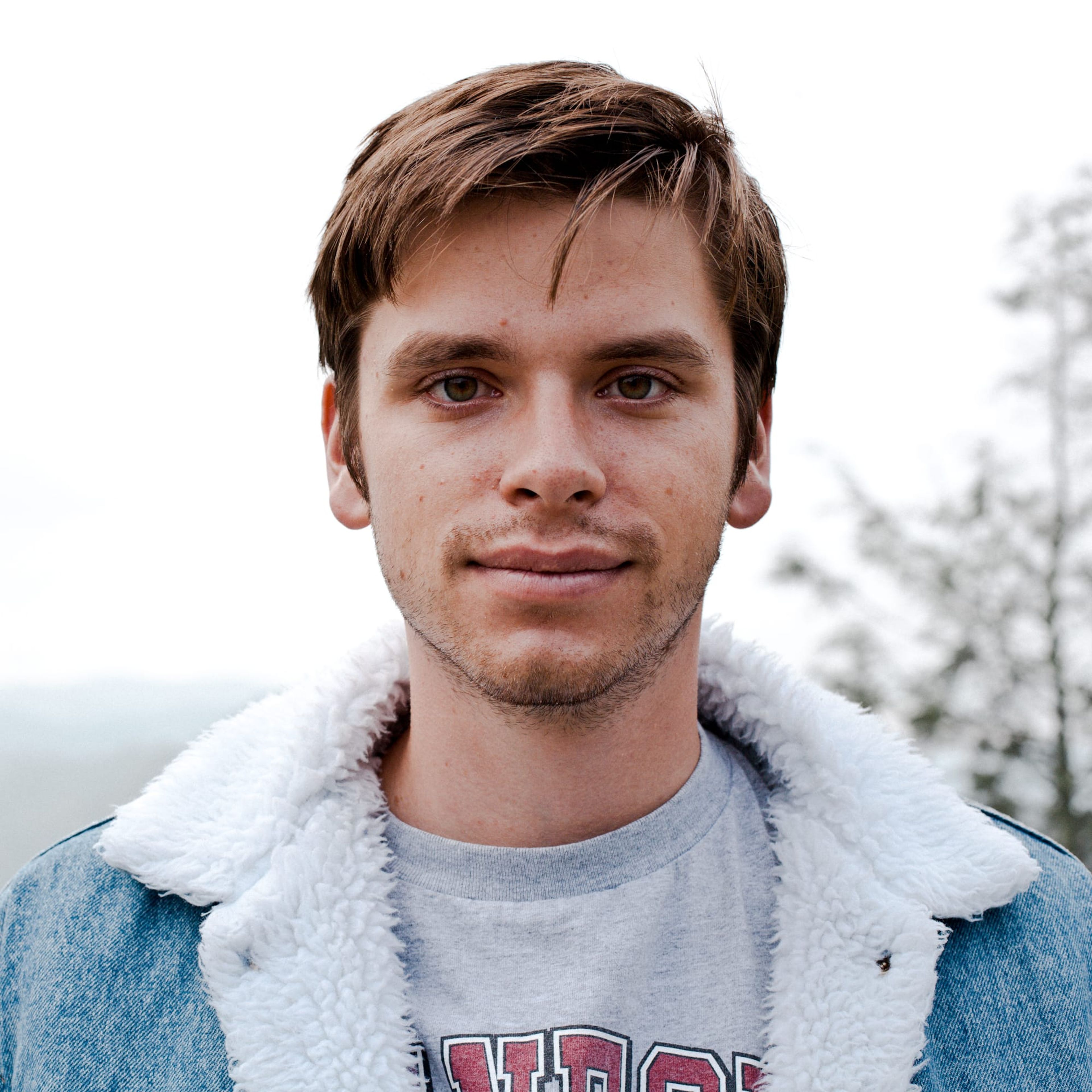 Portrait of Sam in a shearling denim jacket