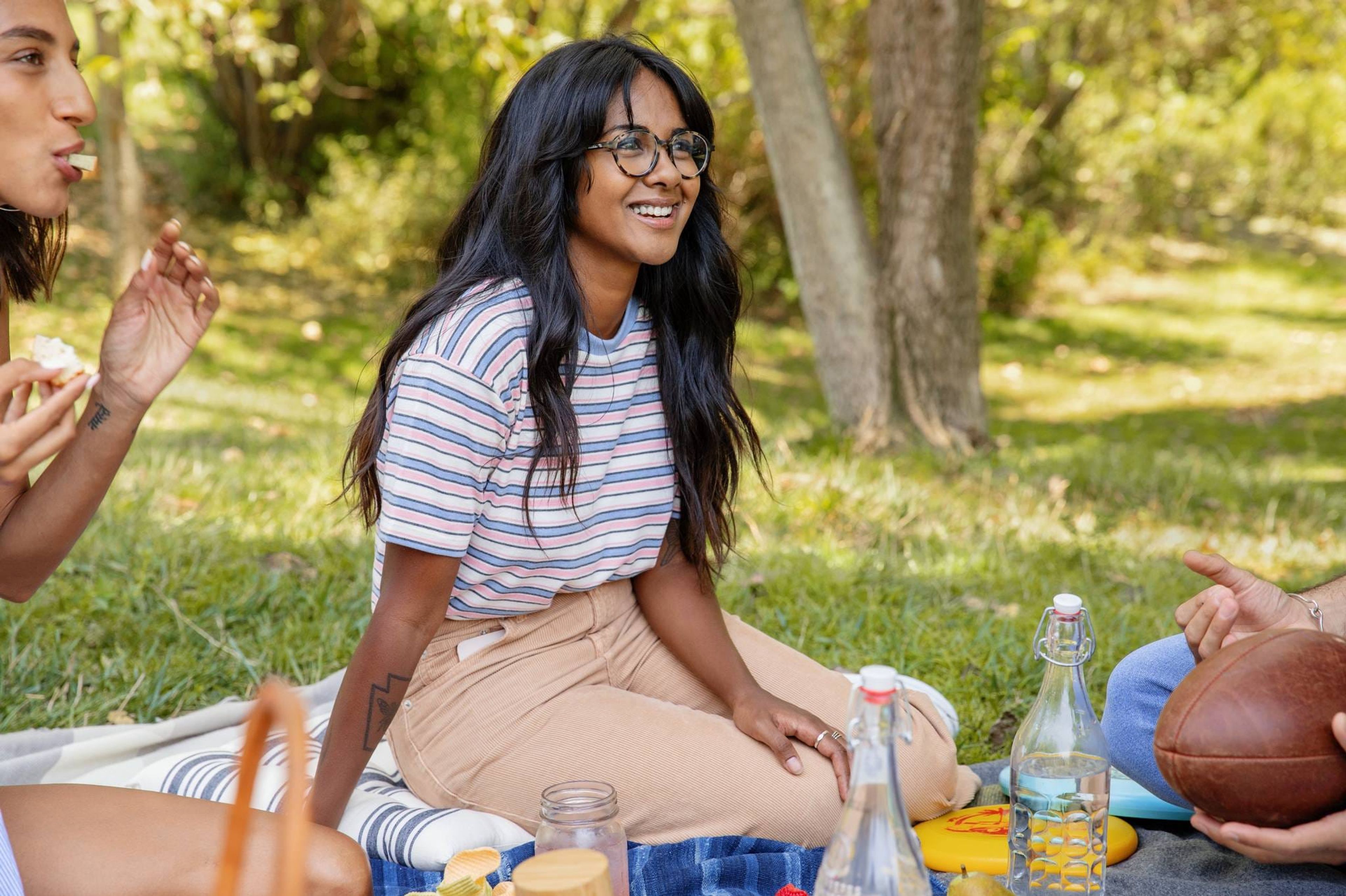 Friends sharing a picnic on the grass