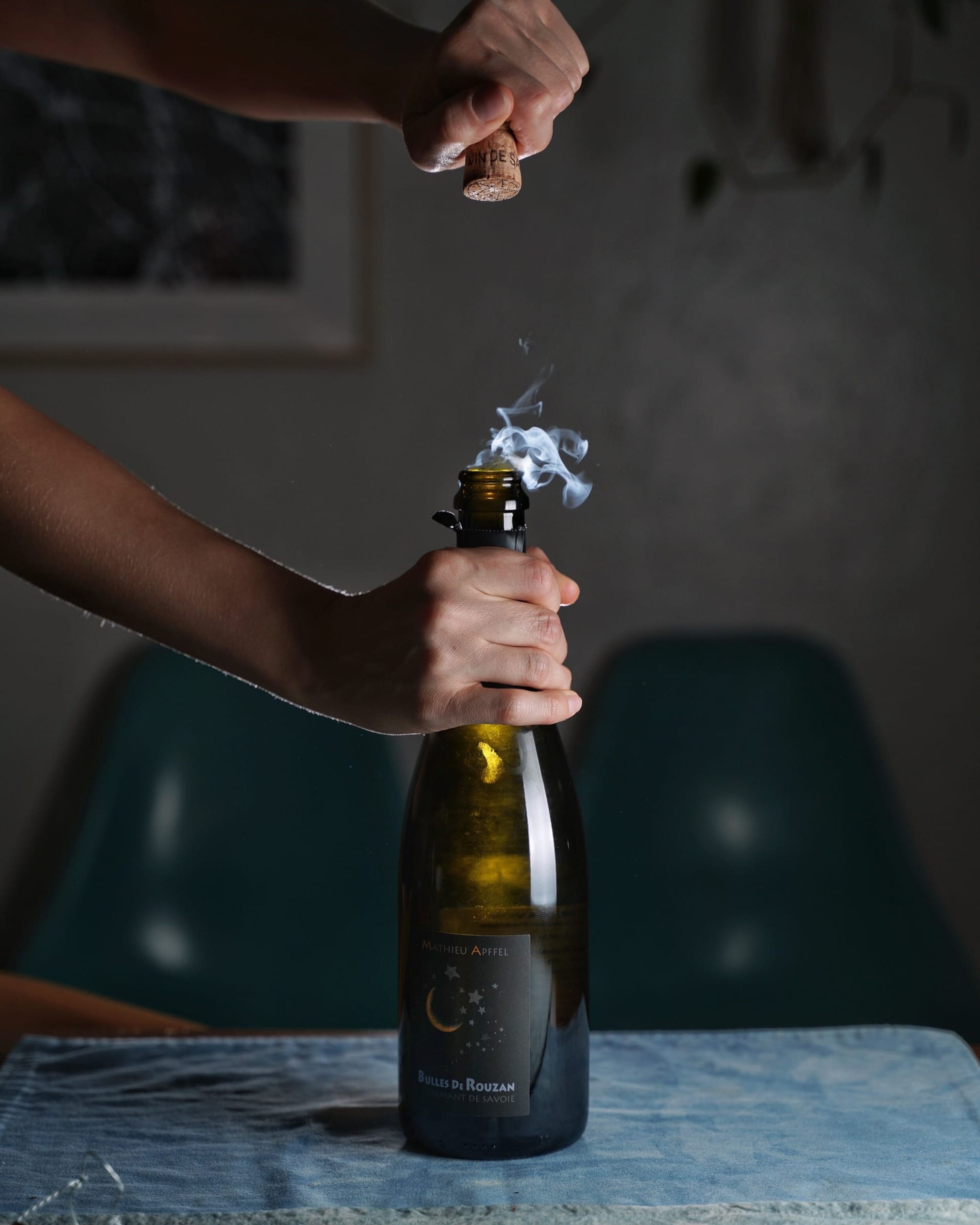 Popping the cork on a bottle of sparkling wine