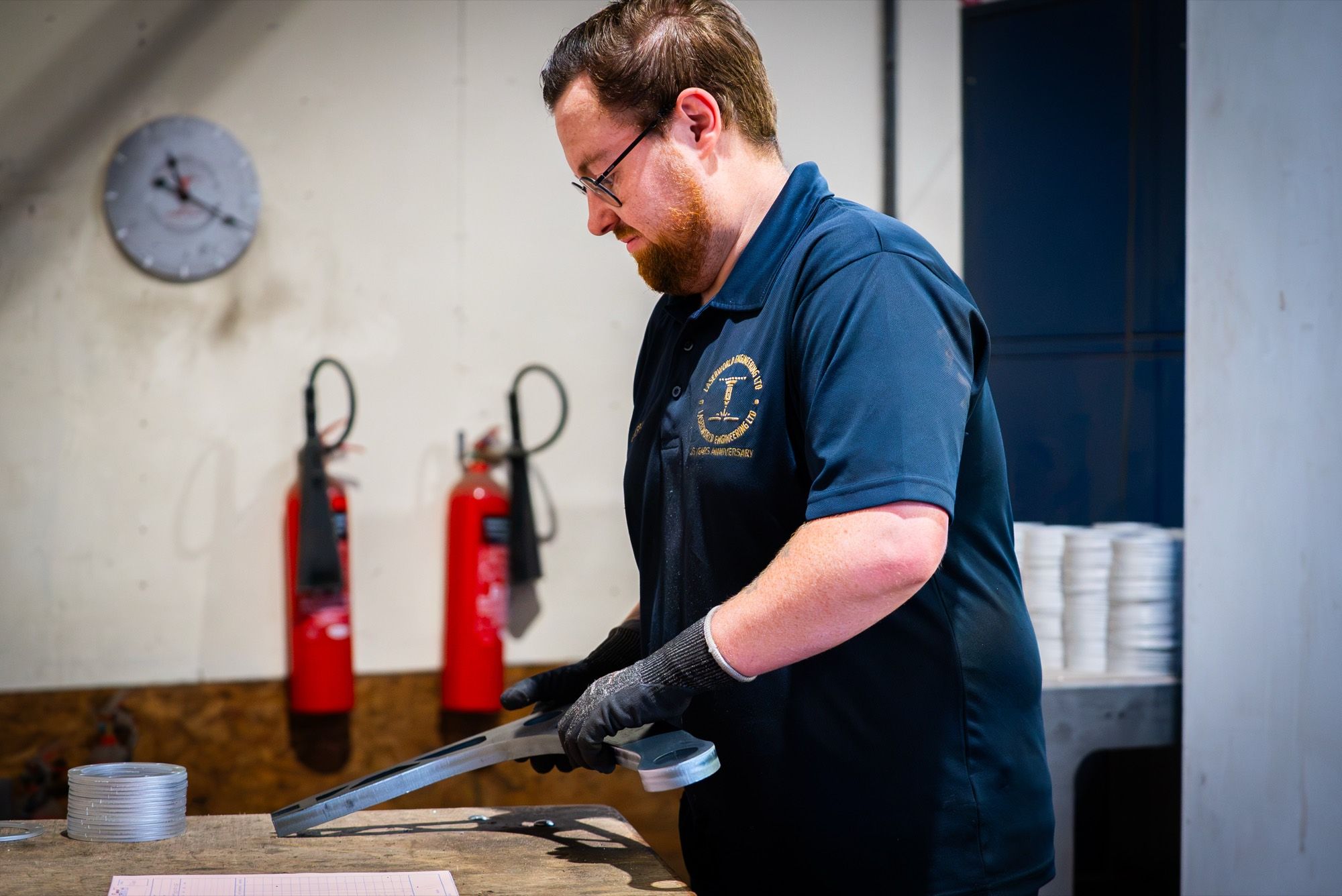 Engineer working on a fabricated part