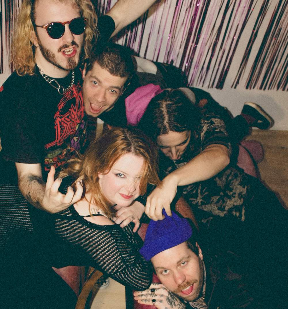 Whole band messing around, having fun in a studio