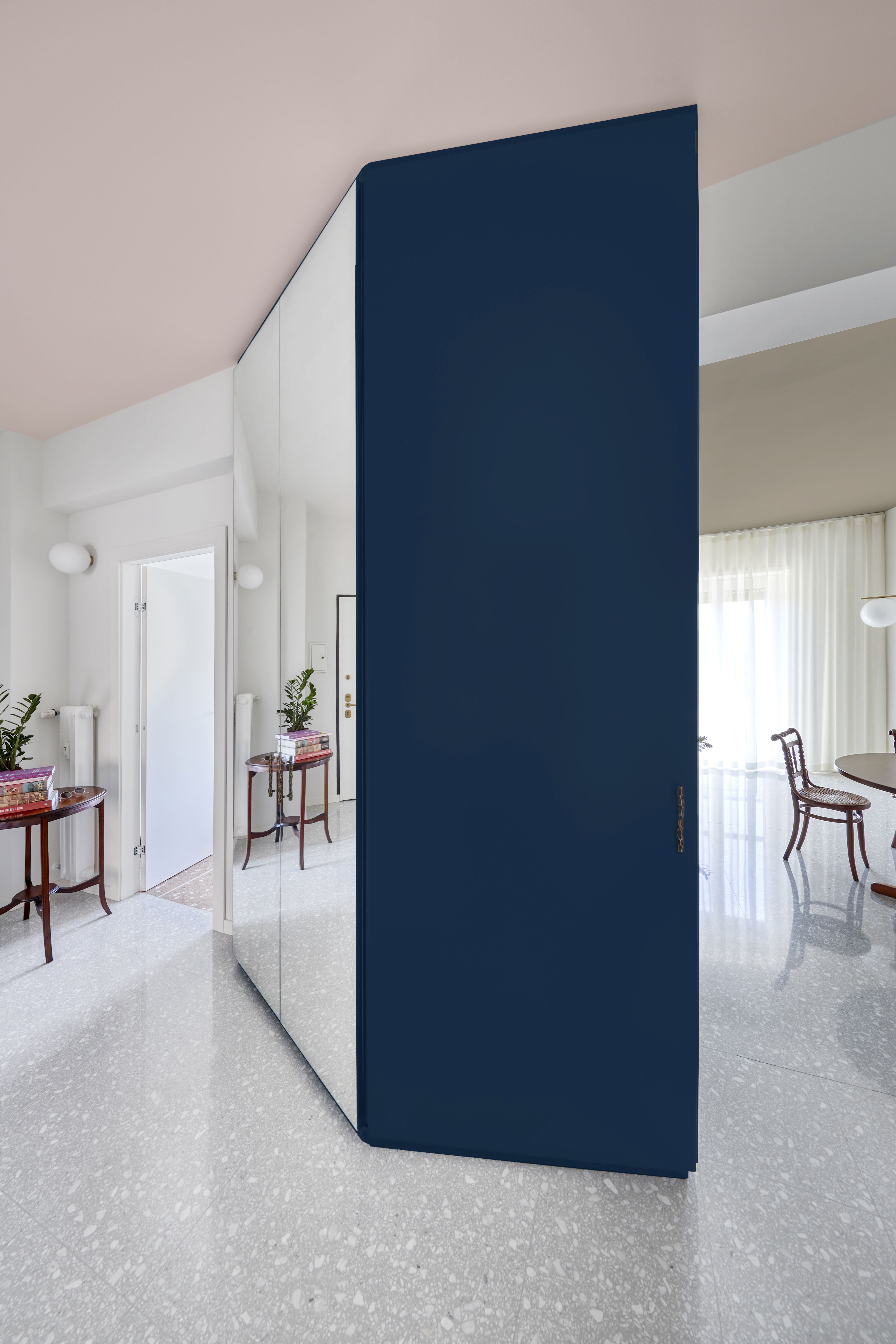 House around a blue volume