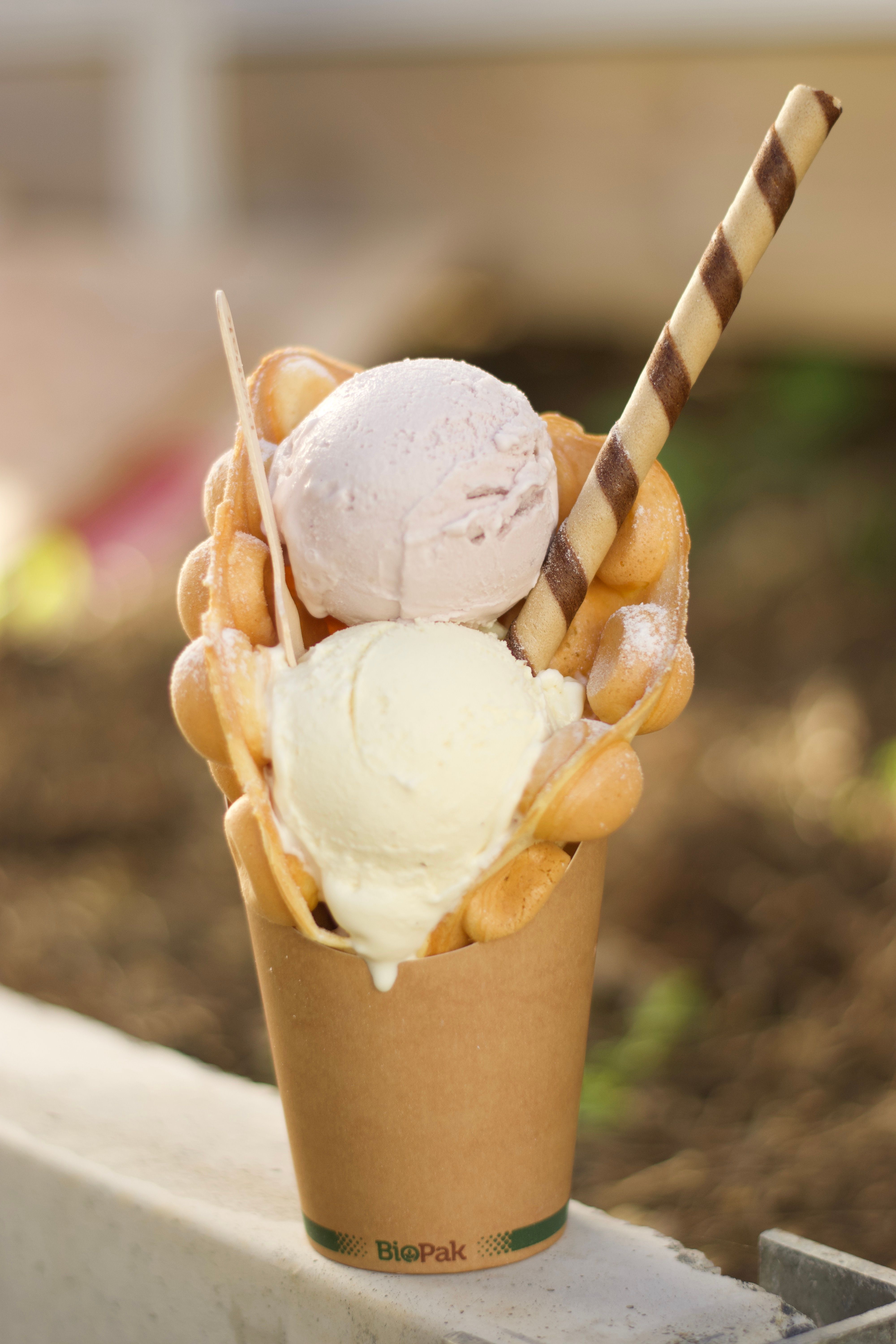 Golden crispy waffle with 1 or 2 scoops of ice cream 