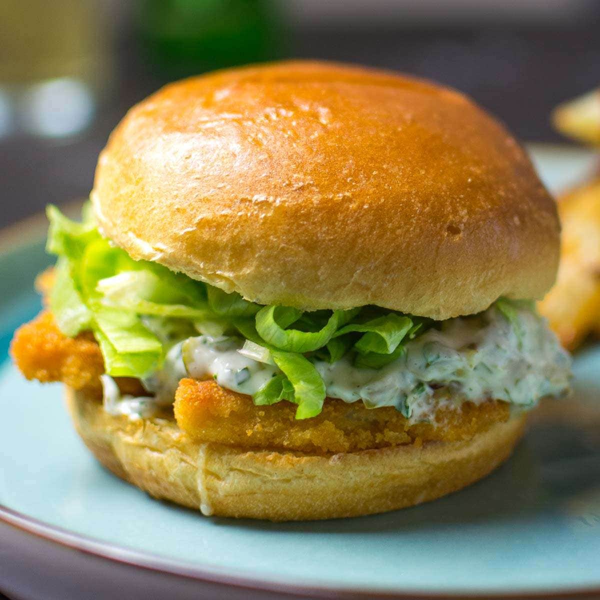 Crispy fish in an artisan bread roll with lettuce and remoulade