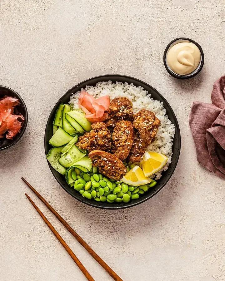 Karaage chicken bowl with sushi rice, carrot and furikake