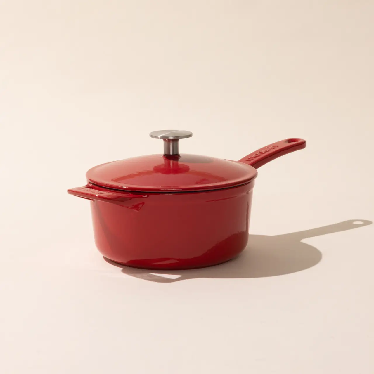 enameled cast iron saucepan made in red with lid