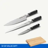 Three kitchen knives with black handles and the engraving "MADE IN," accompanied by a wooden cutting board.