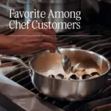 A cook stirs ingredients in a stainless steel pan on a stovetop, with text overlay reading "Favorite Among Chef Customers."