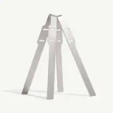 A three-legged metallic structure stands with interlocking tops on a plain background.