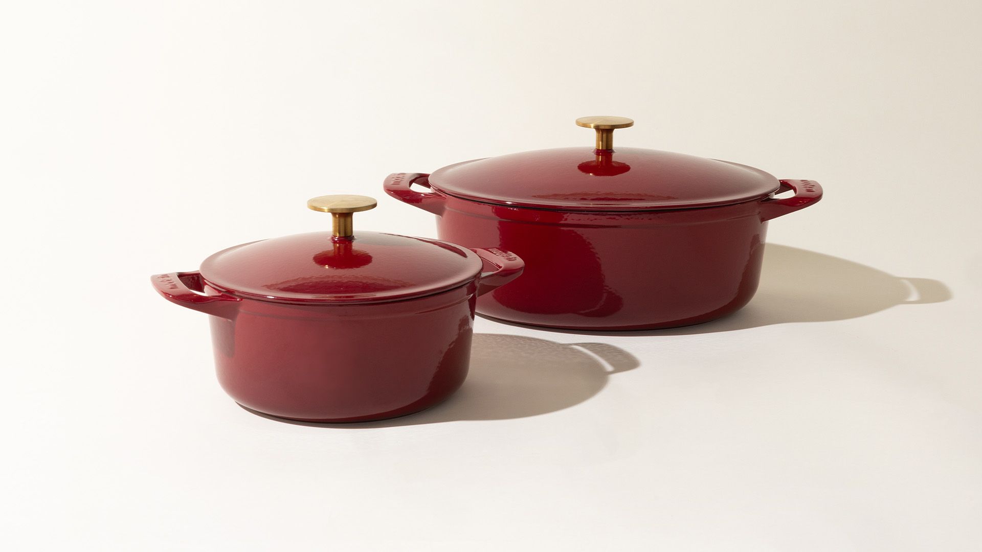 Crofton Cast Iron Red Cherry Enameled 5qt w/ Lid - and - Ernesto Cast Iron  (2010) Dutch Oven w/ Lid. Self Basting. 2 Items - Bunting Online Auctions