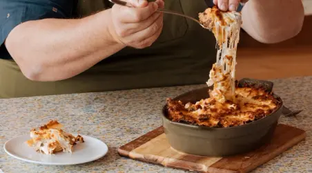 lasagna in oval baking dish