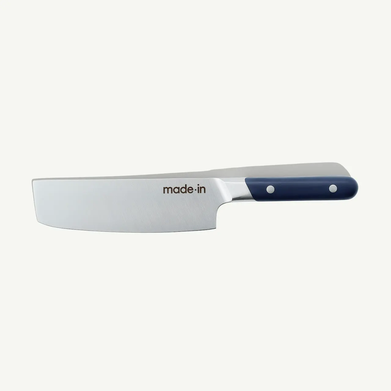 A stainless steel chef's knife with a dark blue handle on a white background.