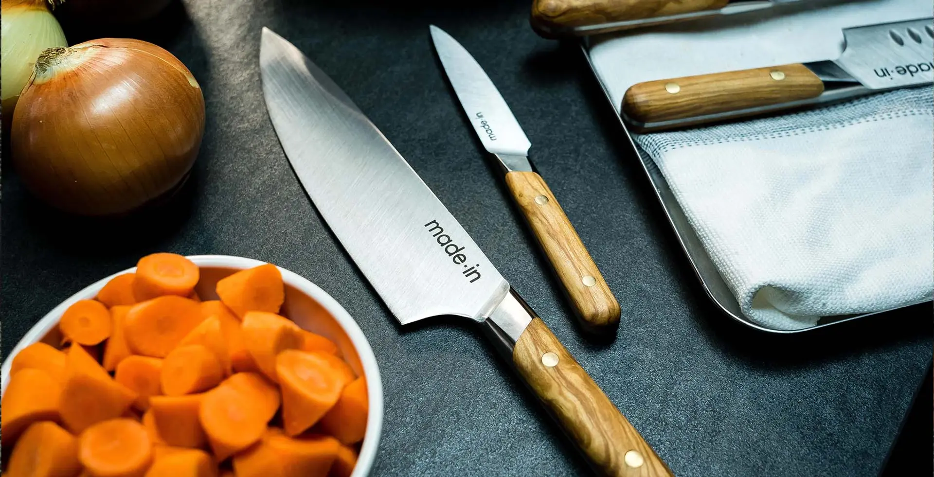 Olive wood knives with vegetables