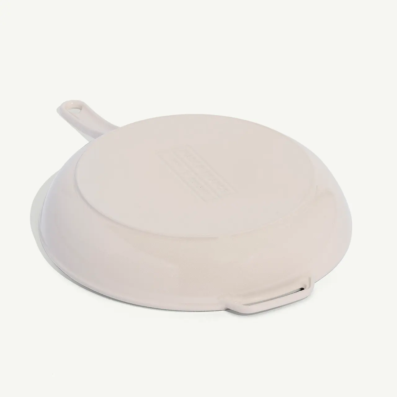 A white plastic tortilla warmer with a handle and lid is shown against a white background.