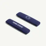 Two navy blue hair clips featuring the Penn State logo and text.