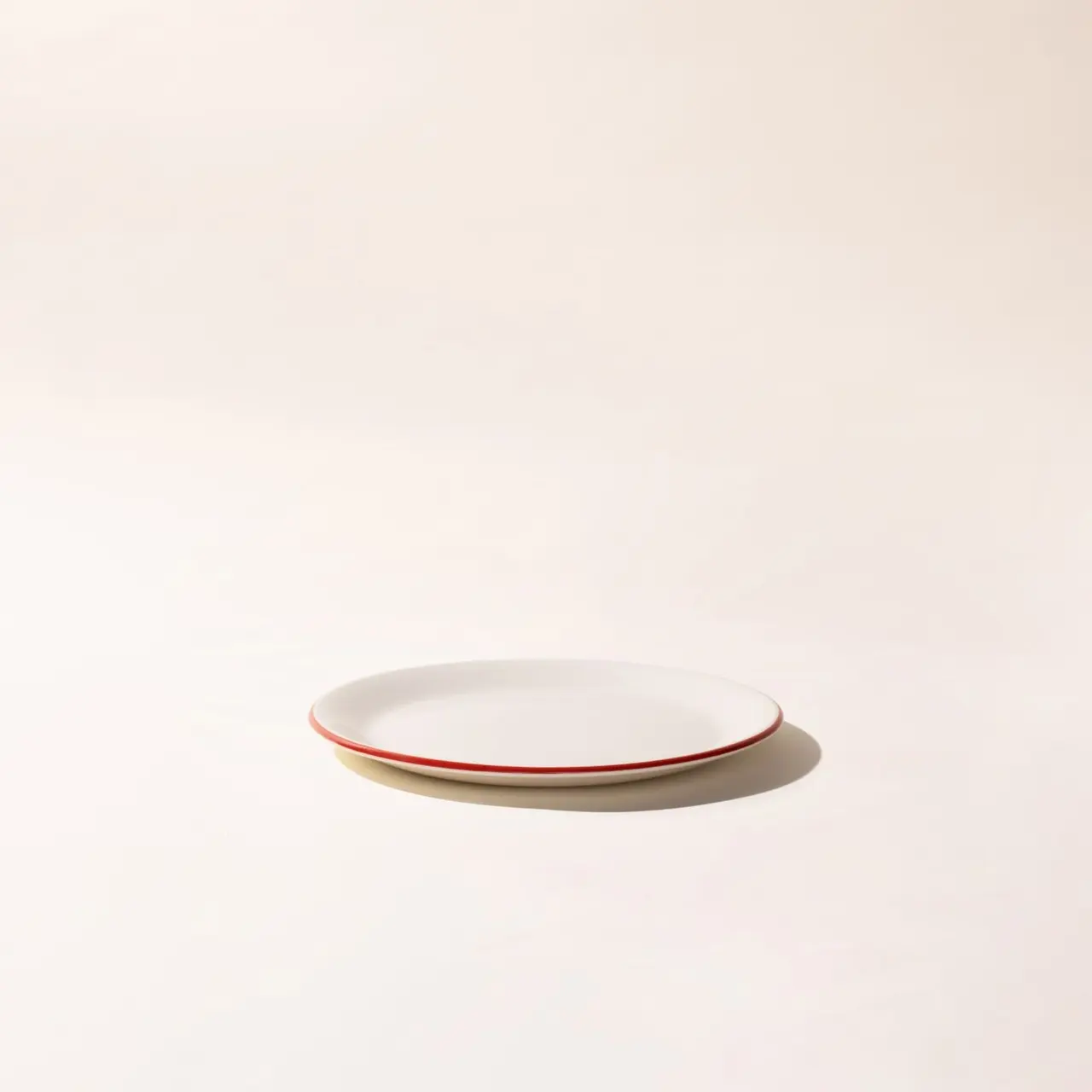 red rim dinner plate side image