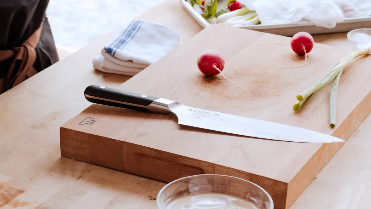 chef knife on cutting board