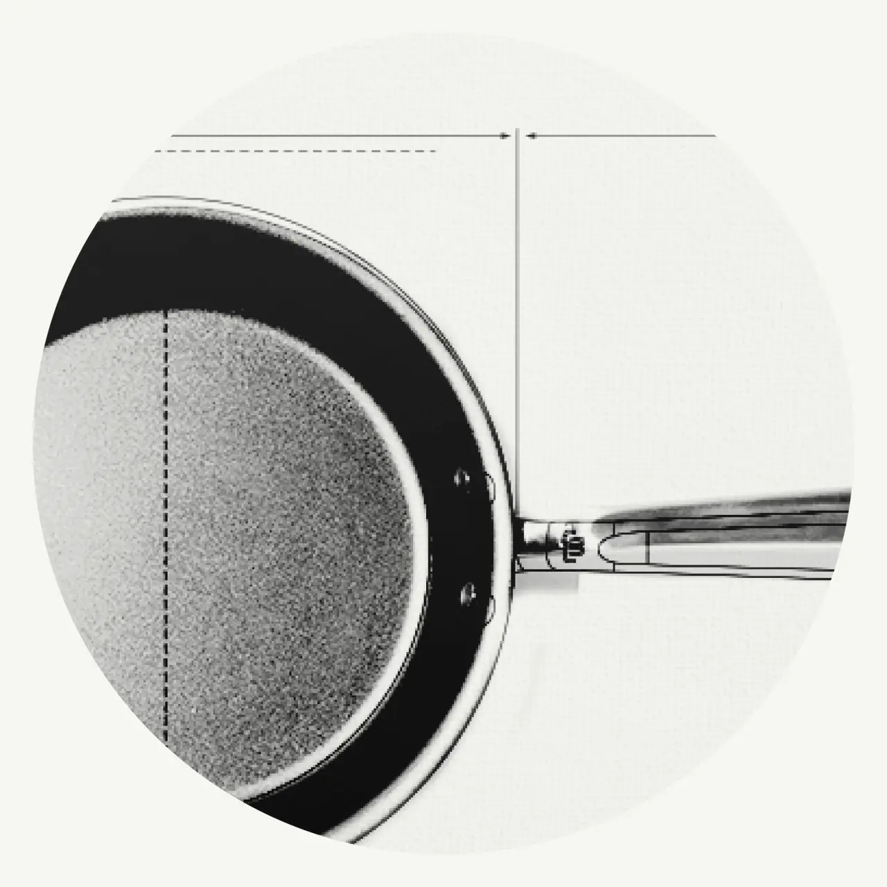 A round frying pan with a handle is illustrated against a textured white background, alongside faint measurement lines.