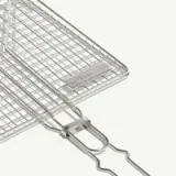 A rectangular grilled basket with a handle, featuring a metal mesh design and stamped with "MADE IN."