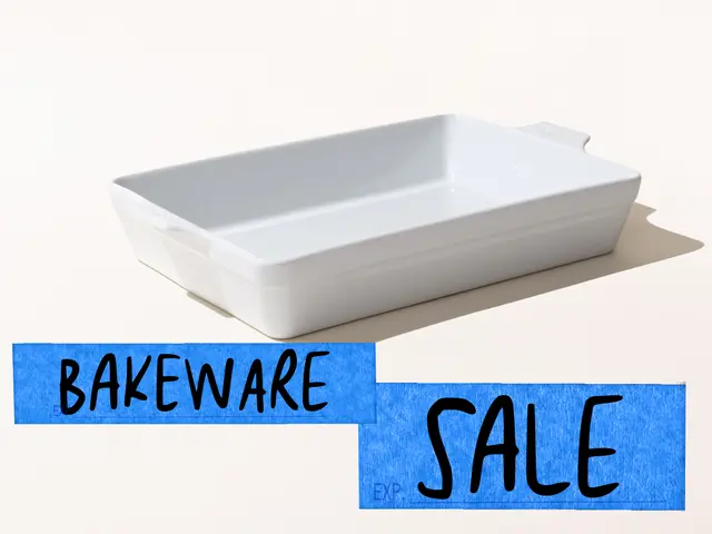 A white ceramic bakeware dish is featured on a plain background with a blue "BAKEWARE SALE" sign below it.