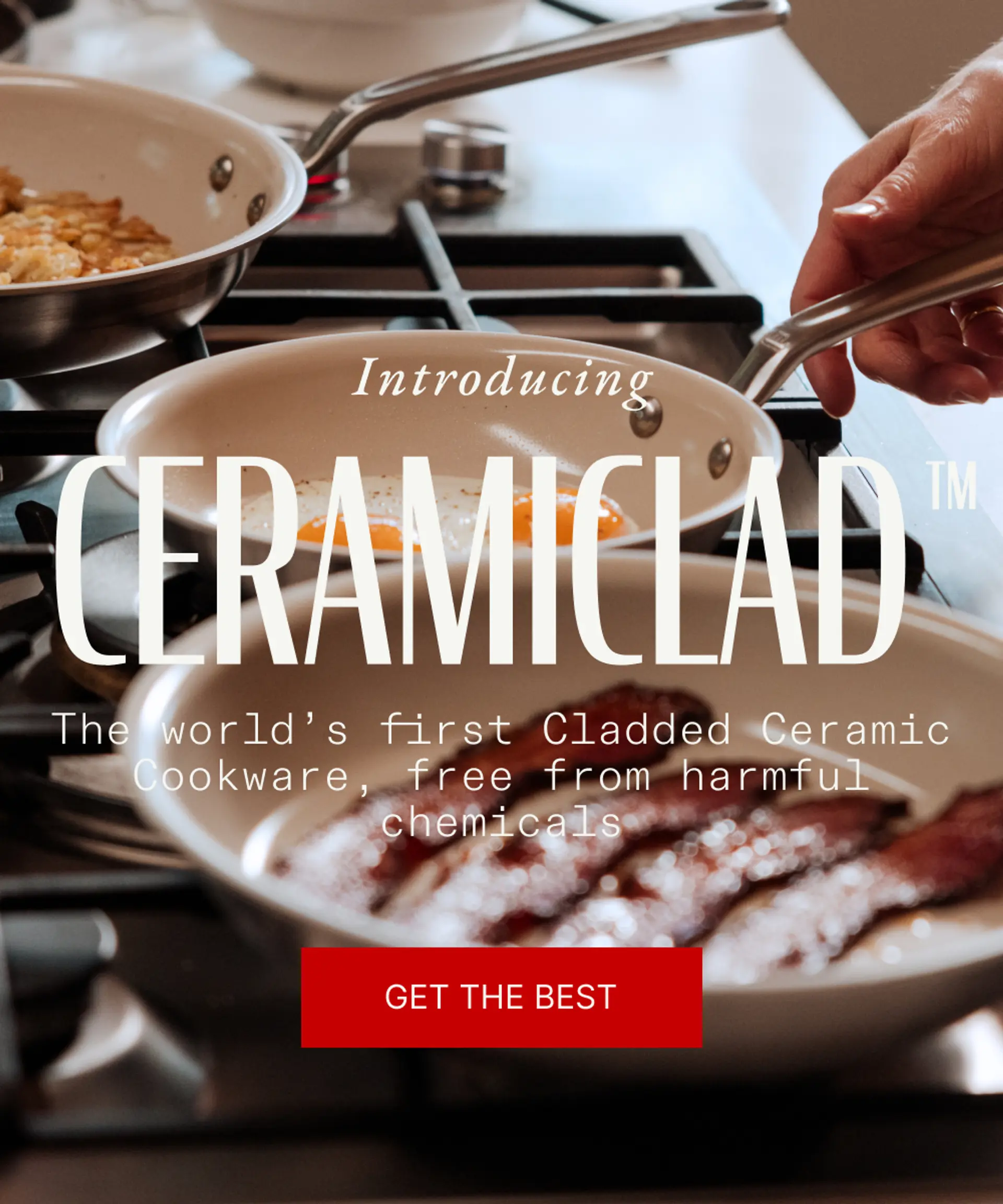 Introducing CERAMICLAD™, the world's first cladded ceramic cookware free from harmful chemicals, showcased alongside cooking food on a stovetop.