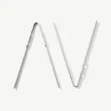 Four different angles of a silver laptop partially open and closed on a white background.