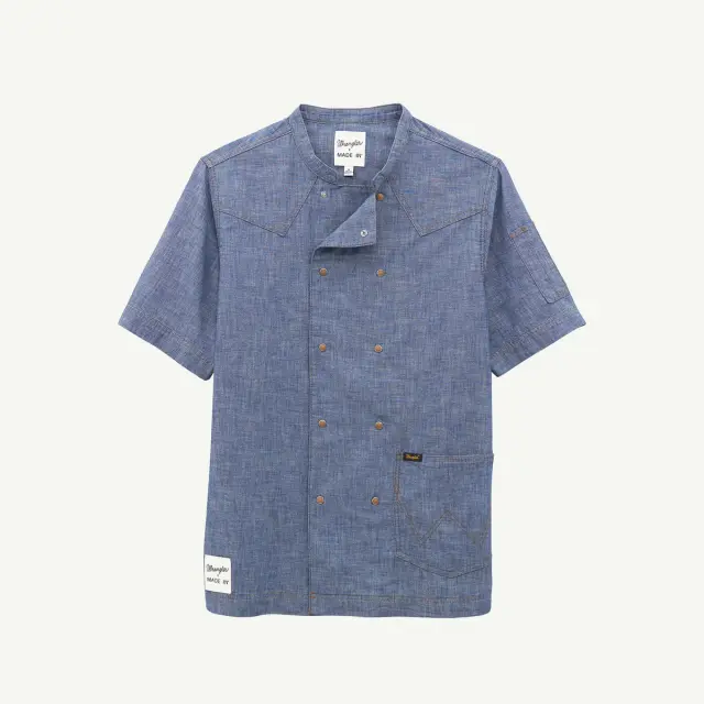 Short-sleeved denim chef jacket with a double-breasted front and a side pocket.