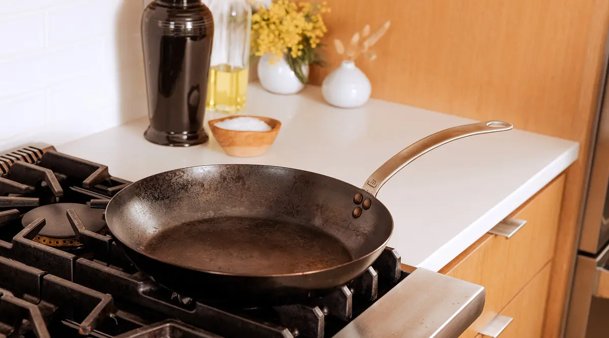 carbon frying pan on stove