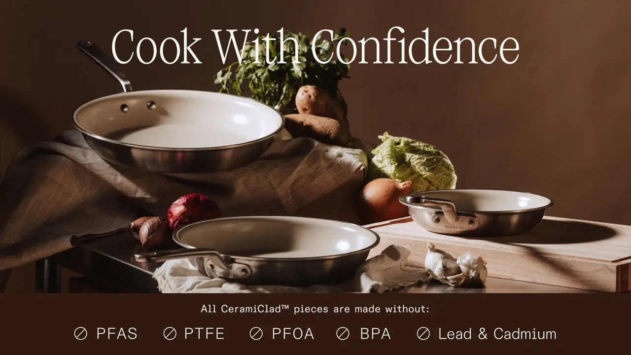 A stylish kitchen setup features ceramic cookware alongside fresh vegetables, promoting safe cooking without harmful chemicals.