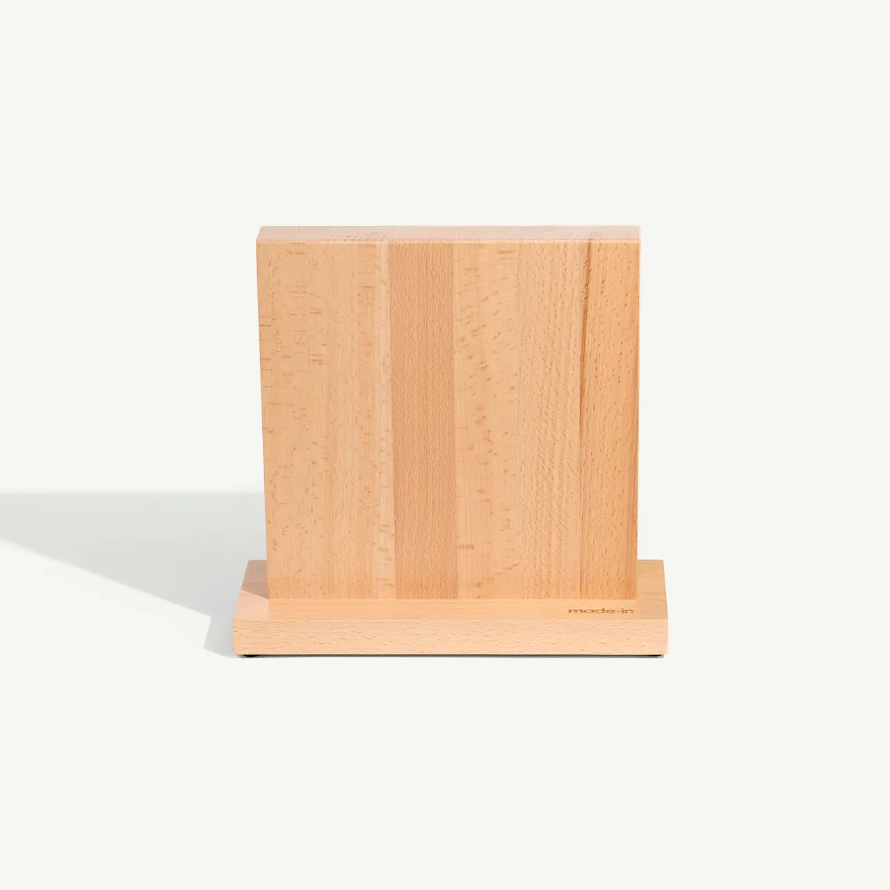 A simple wooden bookend with a vertical piece attached to a flat base, displayed against a white background.