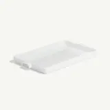 A white rectangular ceramic dish with handles is displayed on a plain background.