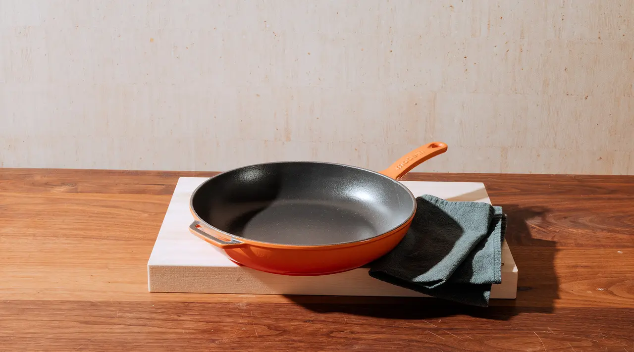 how to clean enameled cast iron skillet